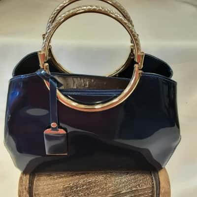 Iridescent blue gold hardware Multi compartment handbag
