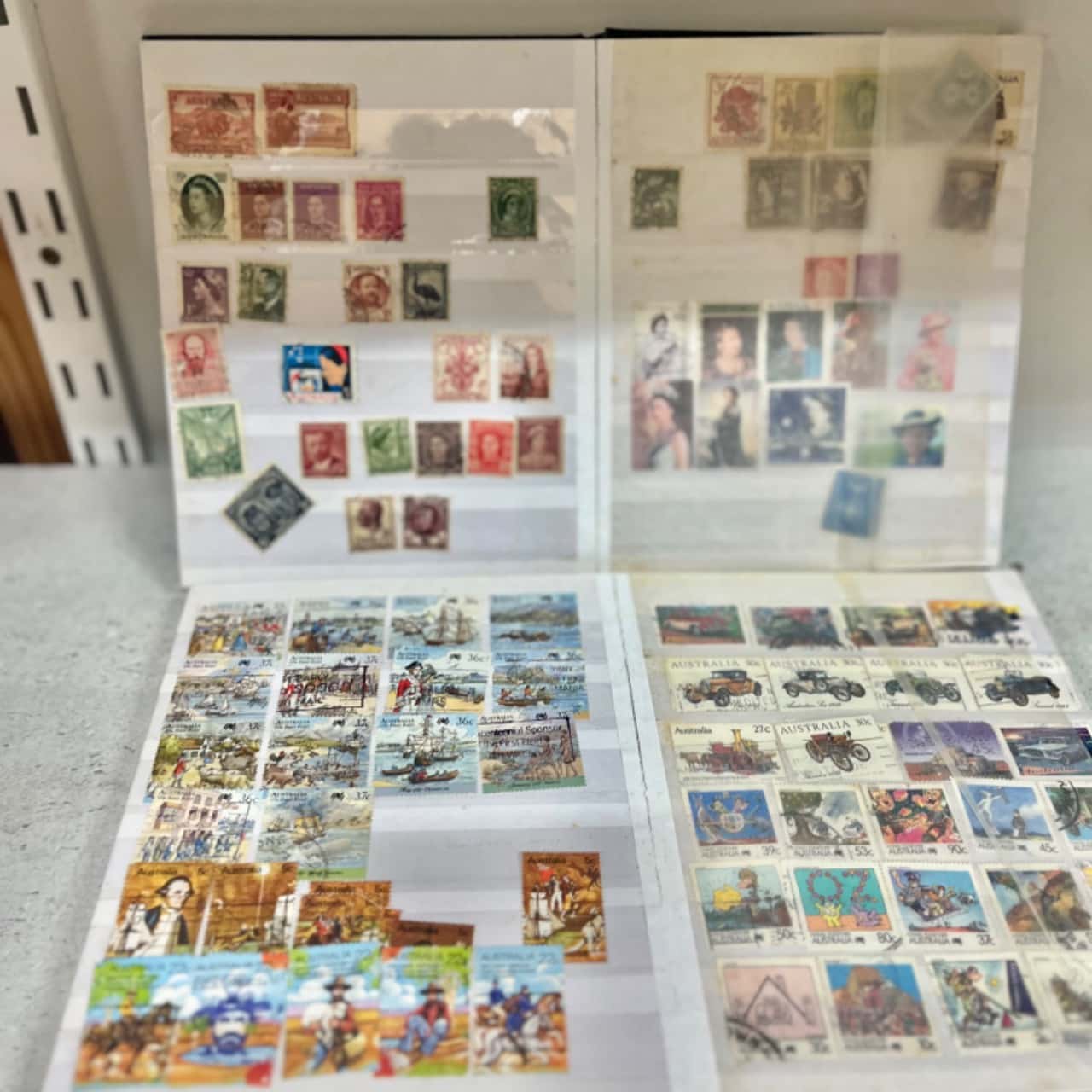 Many Treasures-2x Stamp Albums full of assorted stamps-(s)