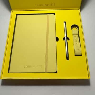 Louenhide Gift Set containing a notebook, pen, and keychain