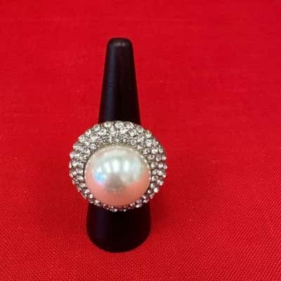  Women's Cocktail Ring featuring a Large Faux Pearl surrounded by Sparkling Stones in a Halo Setting