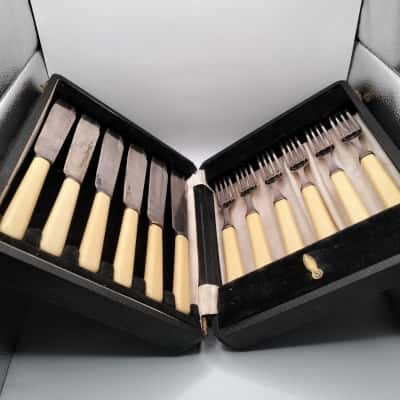 Fish Eater set in a case. Sterling Silver ferrules.  F&W Ltd EPNS
