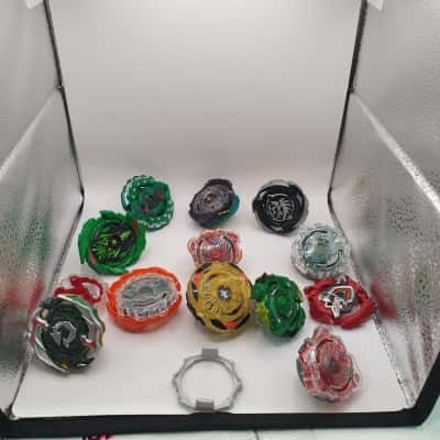 Assorted Beyblade's x8 & loose parts 