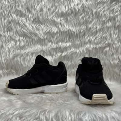 Adidas Kids  Size 4 Black  / White shoes 