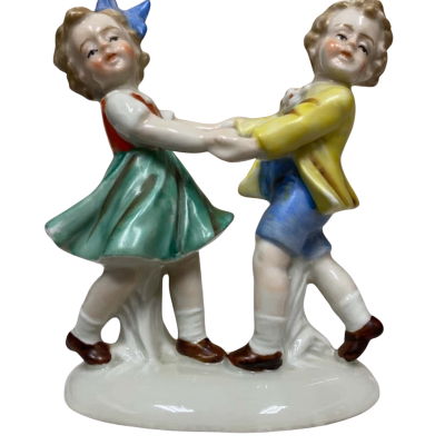 Porcelain figurine dancing children