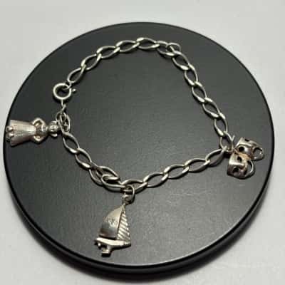  925 Sterling Silver Charm Bracelet With 3 attached charms & 8 unattached charms