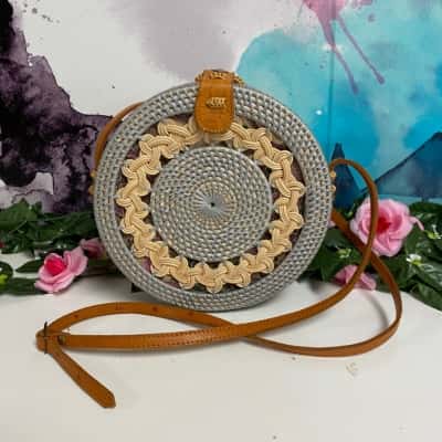 Round trendy wicker material with leather straps New