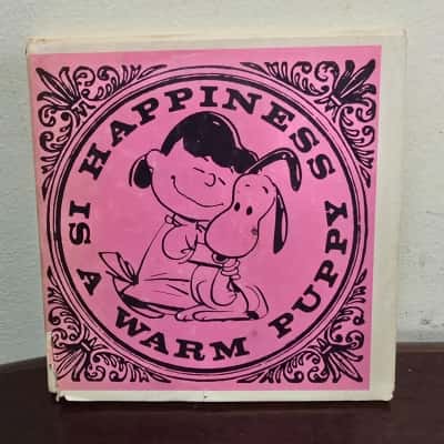 vintage peanuts happiness is a warm puppy book