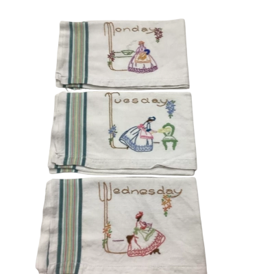 Hand embroidered tea towels x 7 k