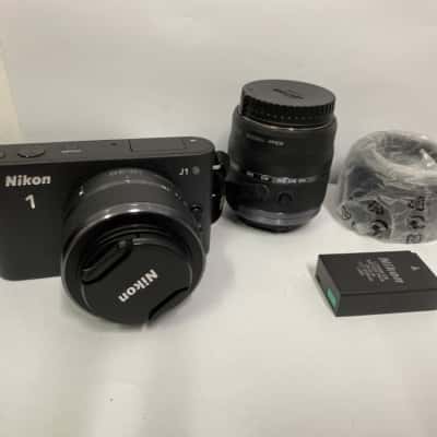 Nikon 1 J1 10.1 MP Digital Camera with Bonus Zoom Lens in Carry case