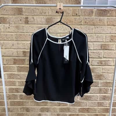  Womens  striking Riley top Size 10 