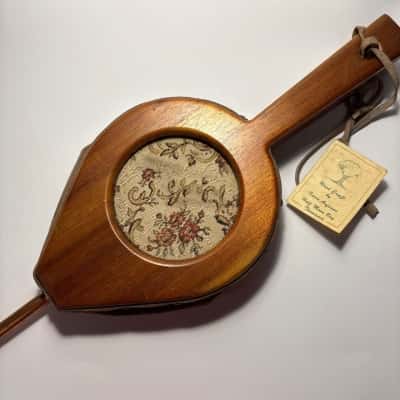 Handmade wooden fireplace bellow crafted by Kevin Aufruns in Tasmania