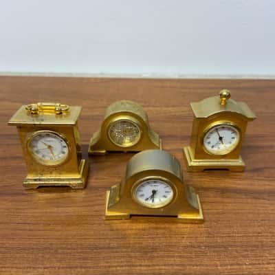 Collection of 4 mini gold toned clocks UNTESTED 