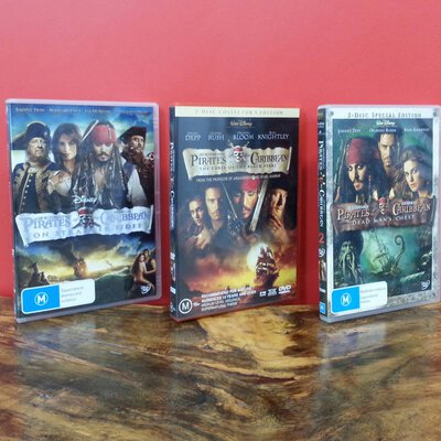 3 DVD's.Pirates's of the Caribbean-The curse of the black pearl,Dead man's chest and On stranger tides.